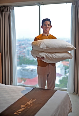 Imagen de la habitación del Hotel Midtown, Surabaya. Foto 13