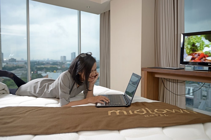 Imagen de la habitación del Hotel Midtown, Surabaya. Foto 14