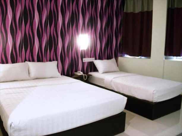 Imagen de la habitación del Hotel Midtown Villa. Foto 2
