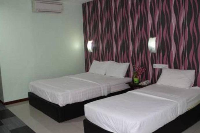 Imagen de la habitación del Hotel Midtown Villa. Foto 3