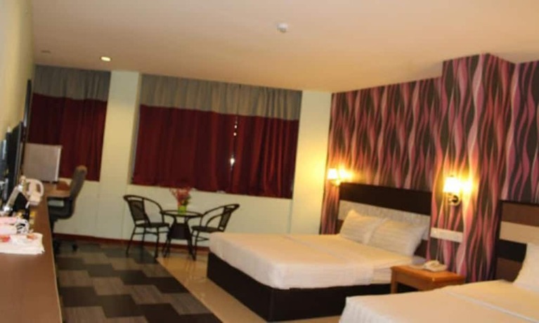 Imagen de la habitación del Hotel Midtown Villa. Foto 4