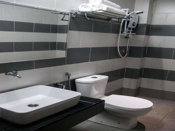 Imagen de la habitación del Hotel Midtown Villa. Foto 8