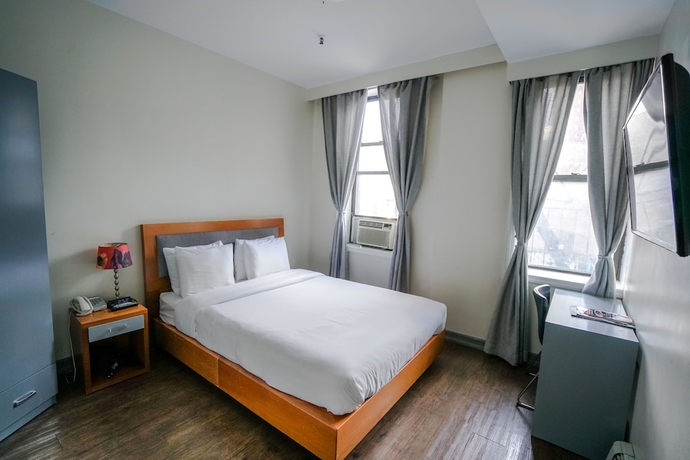 Imagen de la habitación del Hotel Midtown West. Foto 2