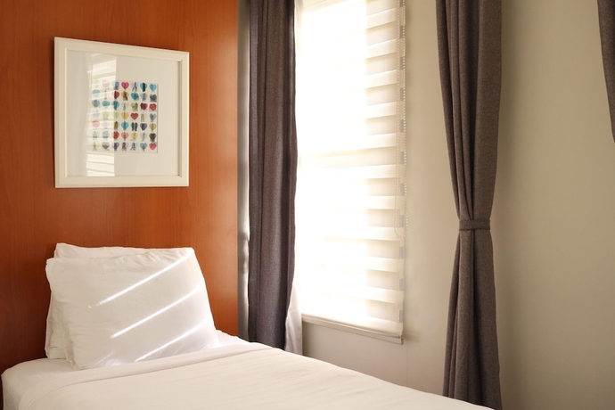 Imagen de la habitación del Hotel Midtown West. Foto 7