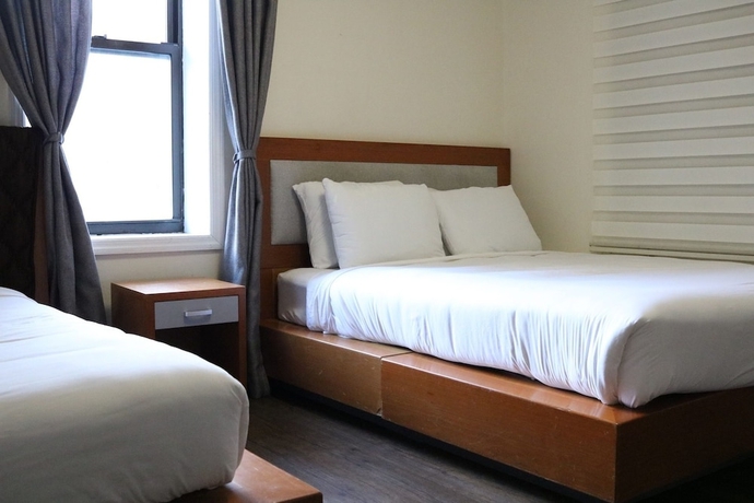 Imagen de la habitación del Hotel Midtown West. Foto 11