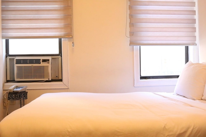 Imagen de la habitación del Hotel Midtown West. Foto 14