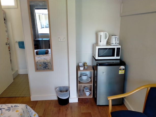 Imagen de la habitación del Hotel Midway Motel and Villas. Foto 11