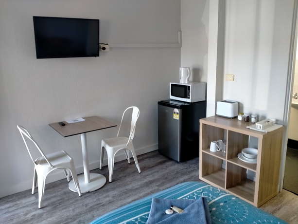 Imagen de la habitación del Hotel Midway Motel and Villas. Foto 15