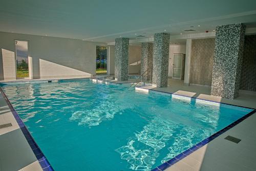 Imagen de la piscina del Hotel Mielno Holiday Apartments. Foto 7