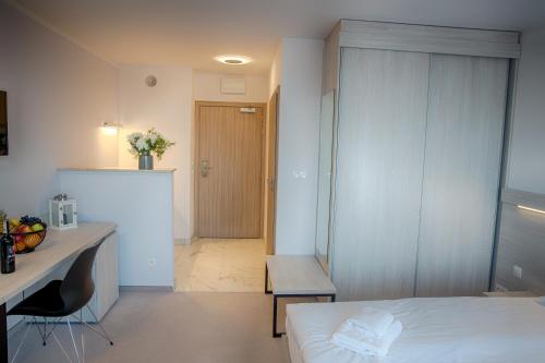 Imagen de la habitación del Hotel Mielno Holiday Apartments. Foto 5