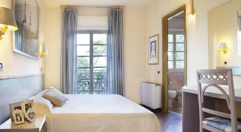 Imagen de la habitación del Hotel Mignon, Forte de Marmi. Foto 2