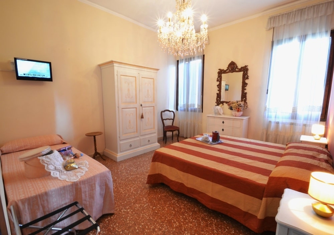Imagen de la habitación del Hotel Mignon, Venecia. Foto 17