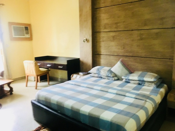 Imagen de la habitación del Hotel Mignonette and Suites. Foto 6