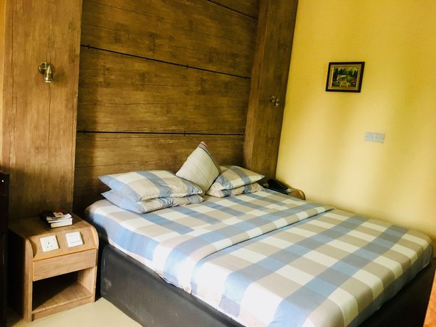 Imagen de la habitación del Hotel Mignonette and Suites. Foto 11