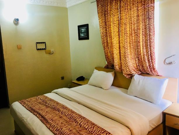 Imagen de la habitación del Hotel Mignonette and Suites. Foto 14