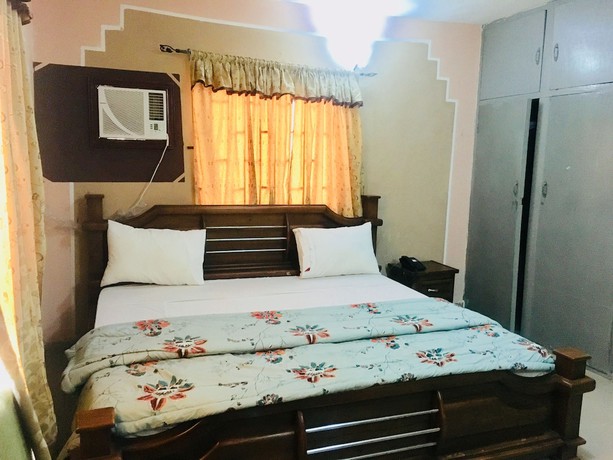 Imagen de la habitación del Hotel Mignonette and Suites. Foto 17