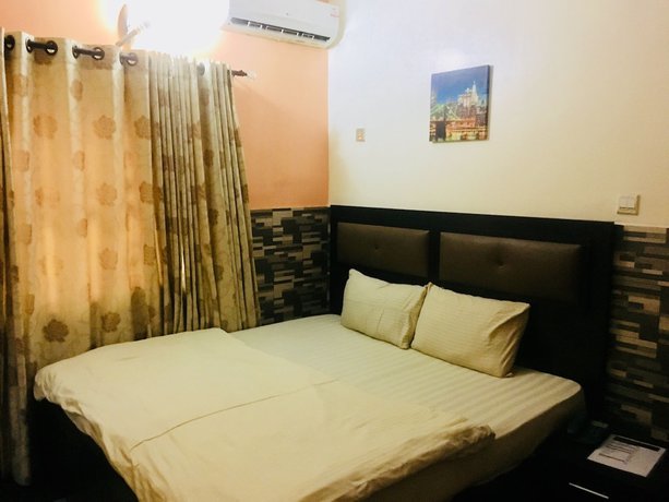 Imagen de la habitación del Hotel Mignonette and Suites. Foto 19