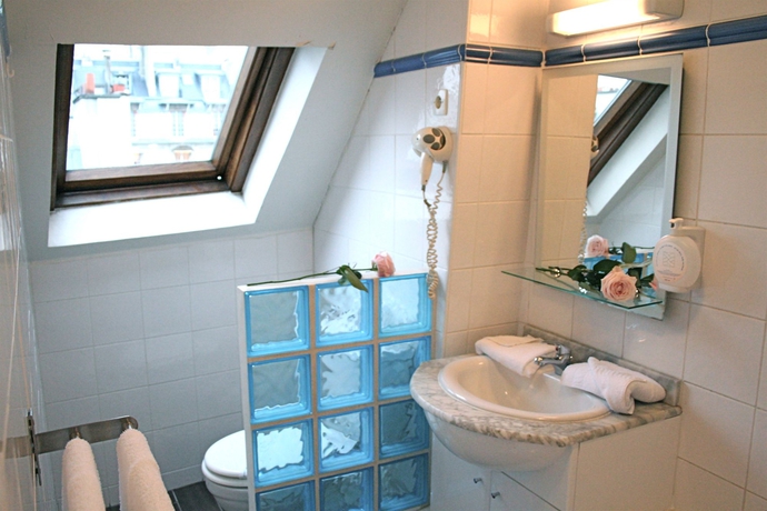 Imagen de la habitación del Hotel Migny Opera Montmartre. Foto 15