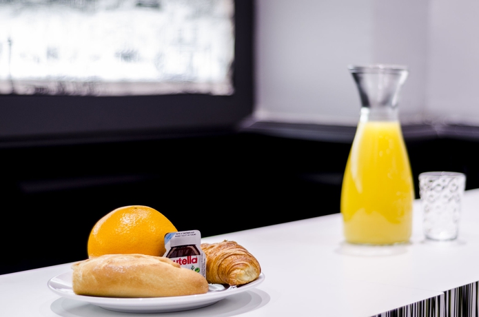 Imagen del bar/restaurante del Hotel Migny Opera Montmartre. Foto 8