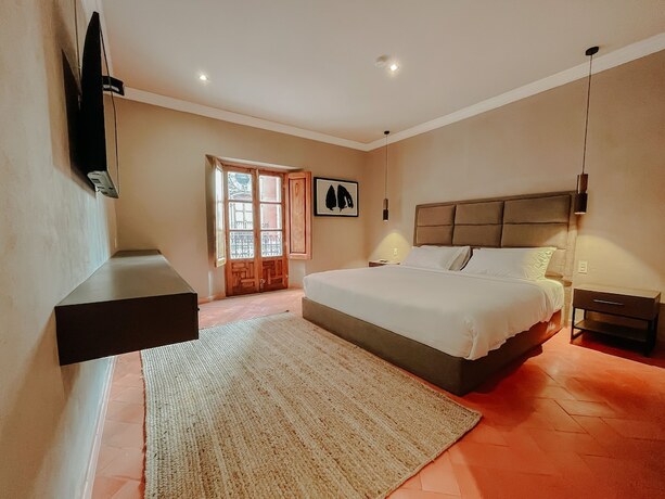 Imagen de la habitación del Hotel Mikaella. Foto 19