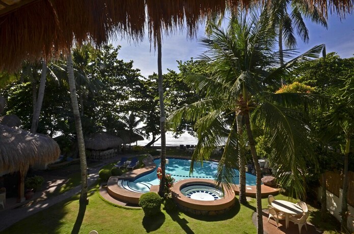 Imagen de la habitación del Hotel Mike's Dauin Beach Resort. Foto 15