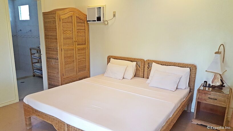 Imagen de la habitación del Hotel Mike's Dauin Beach Resort. Foto 19