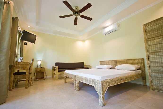 Imagen de la habitación del Hotel Mike's Dauin Beach Resort. Foto 26