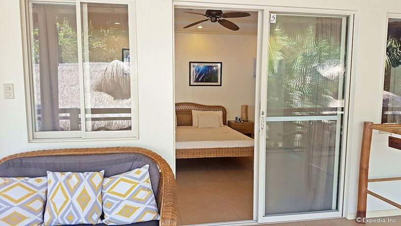 Imagen de la habitación del Hotel Mike's Dauin Beach Resort. Foto 33