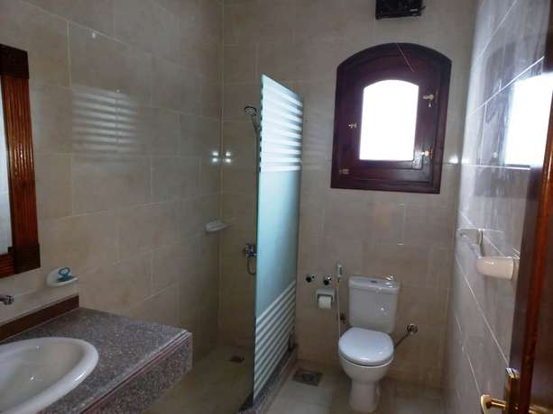 Imagen de la habitación del Hotel Mikhaila Guest House. Foto 9