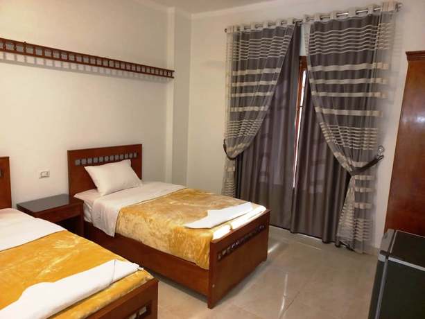Imagen de la habitación del Hotel Mikhaila Guest House. Foto 11