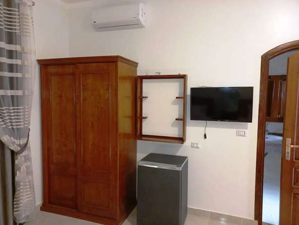 Imagen de la habitación del Hotel Mikhaila Guest House. Foto 12