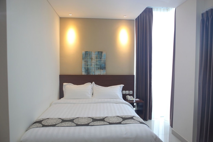 Imagen de la habitación del Hotel Miko Makassar. Foto 9