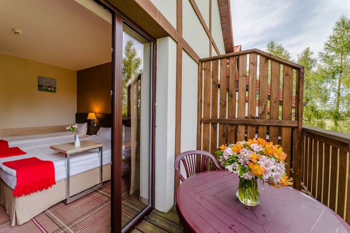 Imagen de la habitación del Hotel Mikołajki Resort and Spa. Foto 9