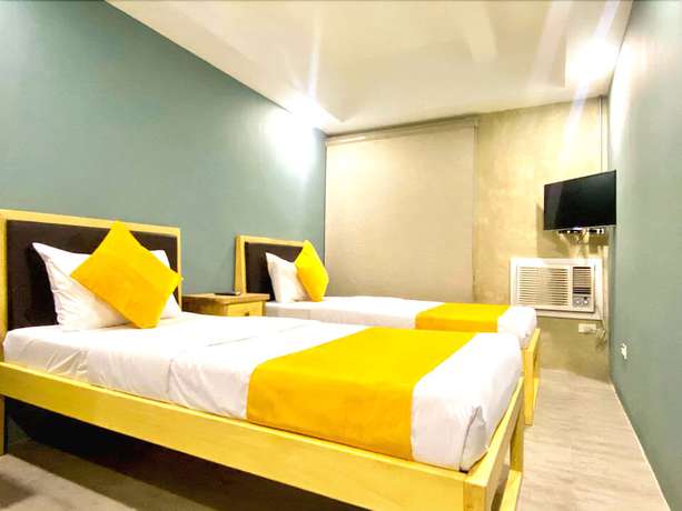 Imagen de la habitación del Hotel Mikos Suites by Mikos Residences. Foto 10