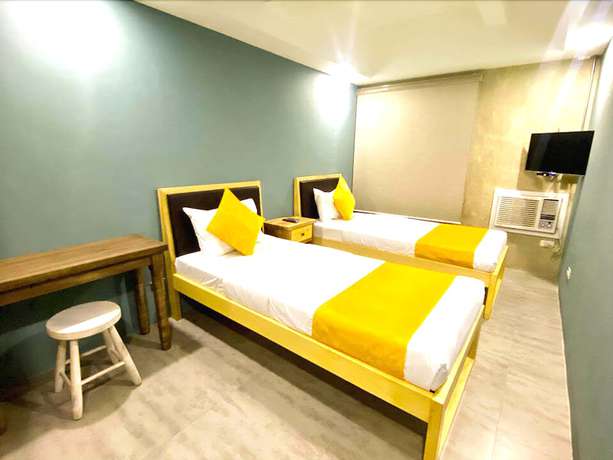 Imagen de la habitación del Hotel Mikos Suites by Mikos Residences. Foto 15