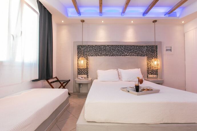 Imagen de la habitación del Hotel Mikri Vigla Beach Resort. Foto 11