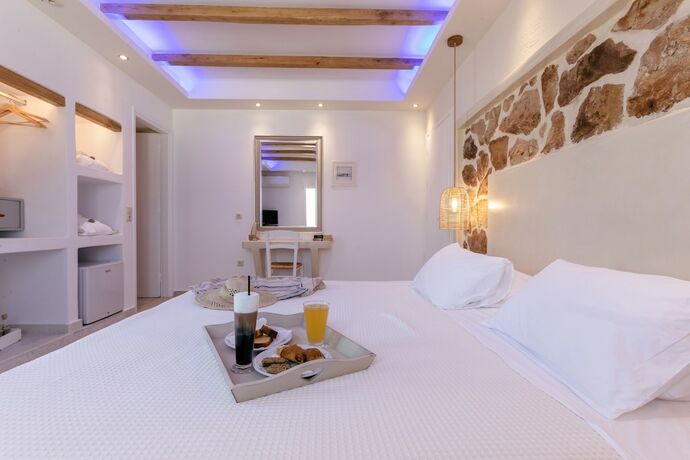 Imagen de la habitación del Hotel Mikri Vigla Beach Resort. Foto 15