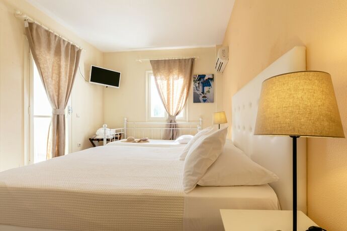 Imagen de la habitación del Hotel Mikri Vigla Beach Resort. Foto 19