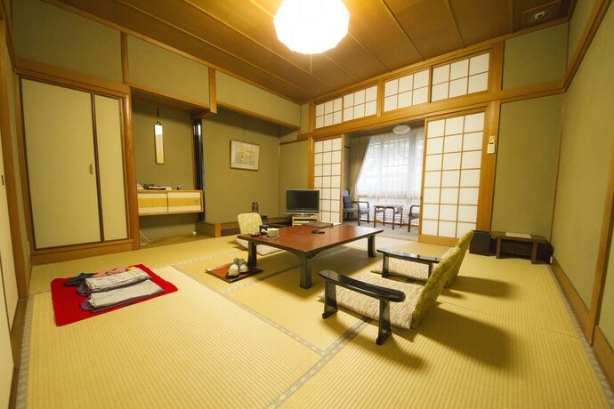 Imagen de la habitación del Hotel Mikuniya. Foto 22