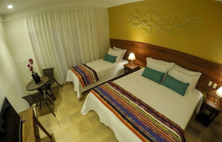 Imagen de la habitación del Hotel Mil Flores. Foto 12