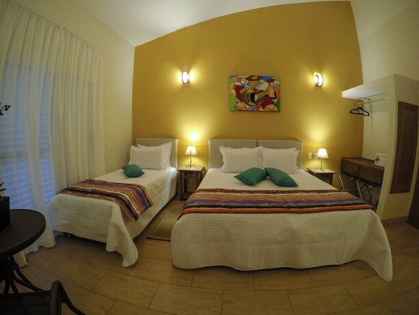 Imagen de la habitación del Hotel Mil Flores. Foto 16
