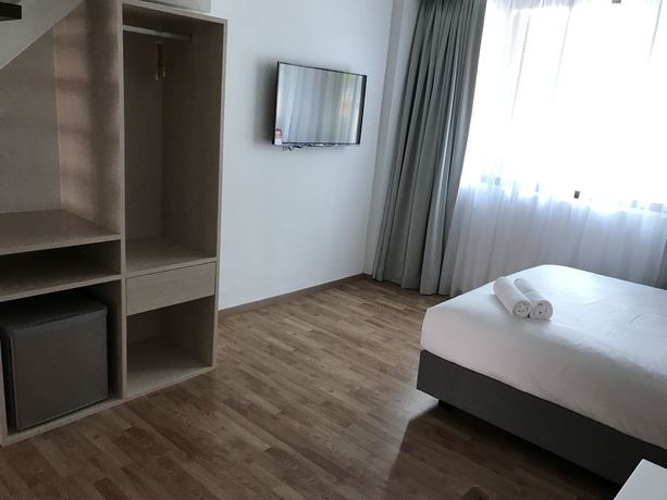 Imagen de la habitación del Hotel Mil The Boutique Residence. Foto 8