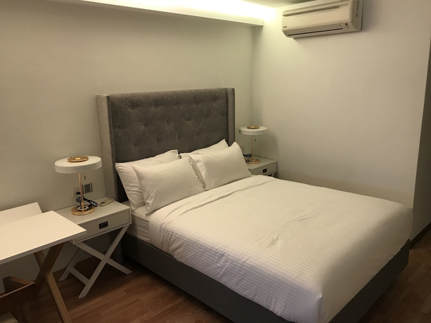 Imagen de la habitación del Hotel Mil The Boutique Residence. Foto 10