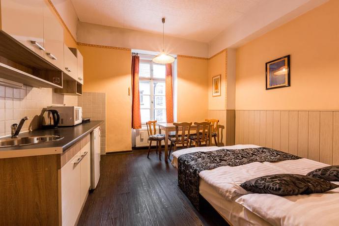 Imagen de la habitación del Hotel Mila Apartments. Foto 9