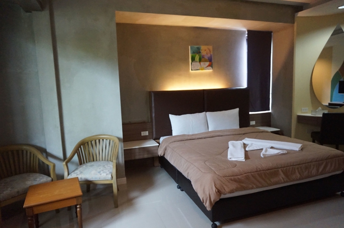 Imagen de la habitación del Hotel Mila Garden. Foto 7