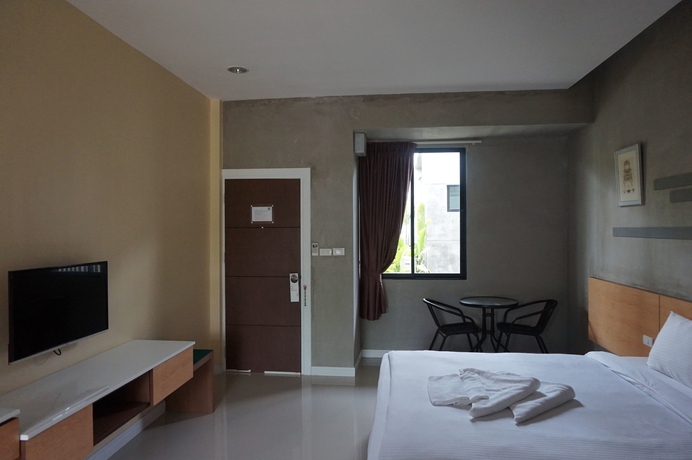 Imagen de la habitación del Hotel Mila Garden. Foto 8