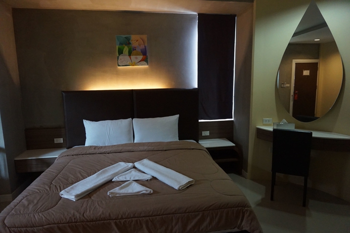 Imagen de la habitación del Hotel Mila Garden. Foto 10