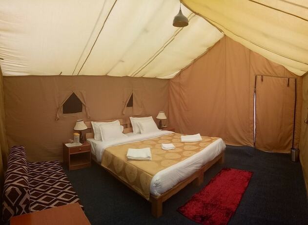 Imagen de la habitación del Hotel Mila Retreat Camp. Foto 12