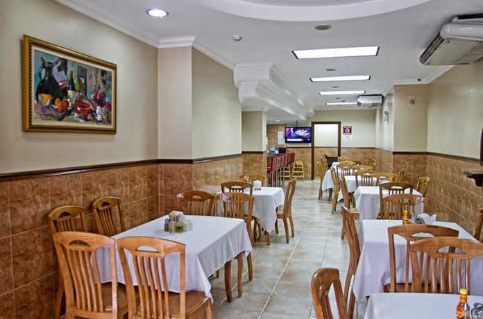 Imagen del bar/restaurante del Hotel Milan, Bella Vista. Foto 6