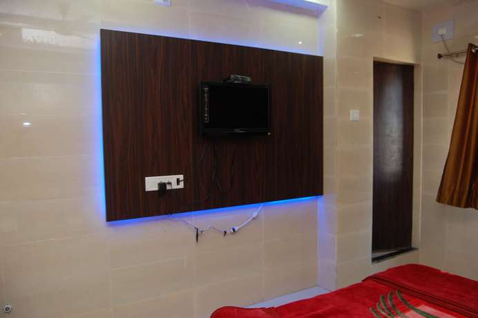 Imagen de la habitación del Hotel Milan, Dwarka. Foto 5